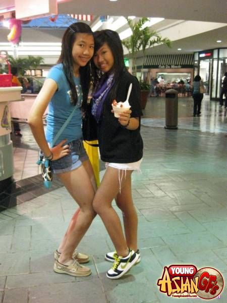 Asian girlfriends posing for cell phone pics #67344595