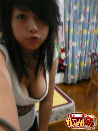 Asian girlfriends posing for cell phone pics #67344643