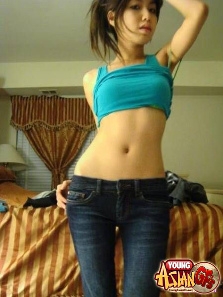 Asian girlfriends posing for cell phone pics #67344661
