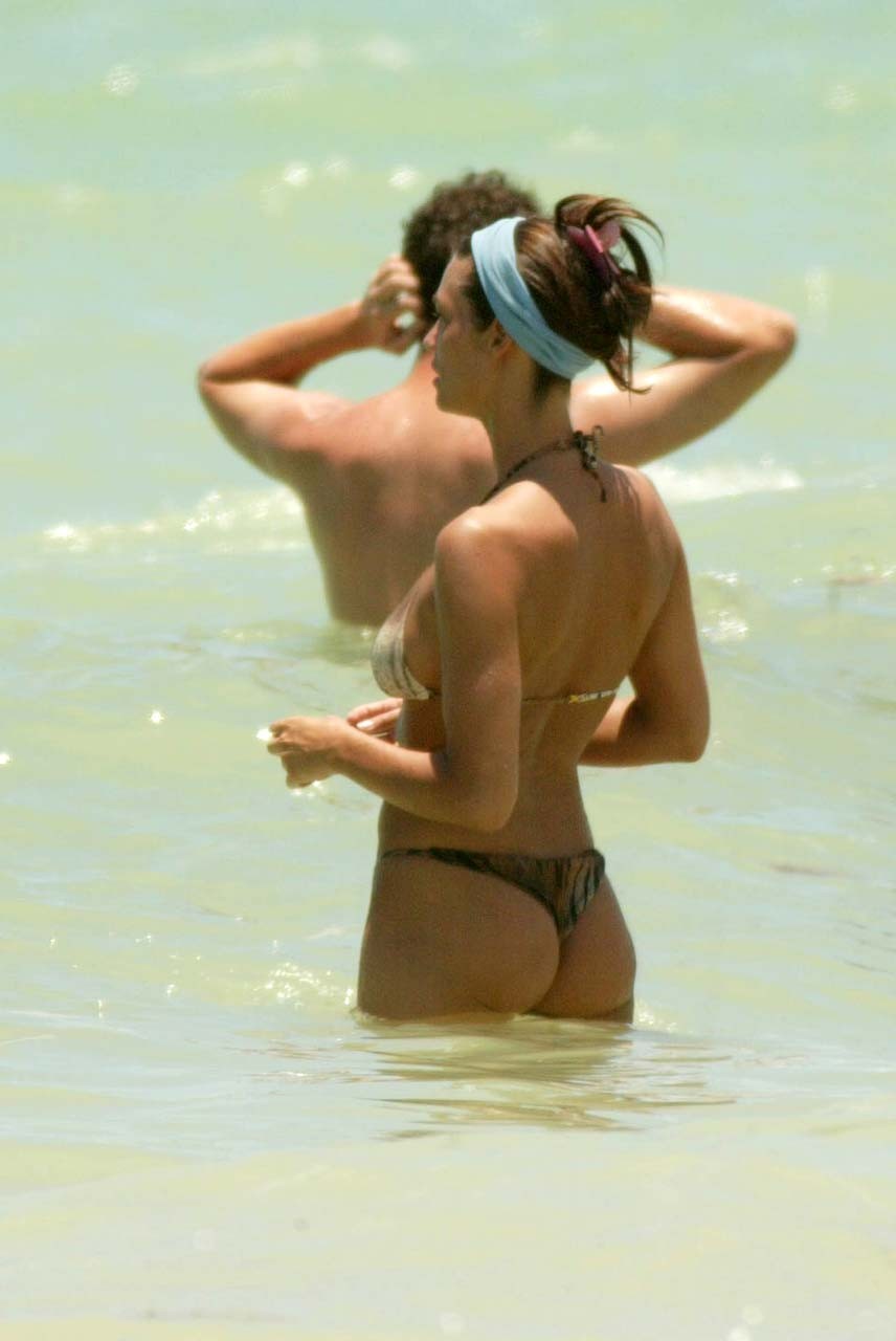 Manuela Arcuri exposing her nice big boobs on beach and ass in thong paparazzi p #75318191