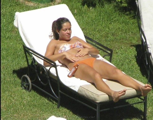 Celebrity babe Ana Ivanovic sunbathing in sexy orange bikini #75402469