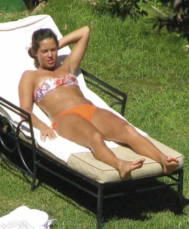 Celebrity babe Ana Ivanovic sunbathing in sexy orange bikini #75402511