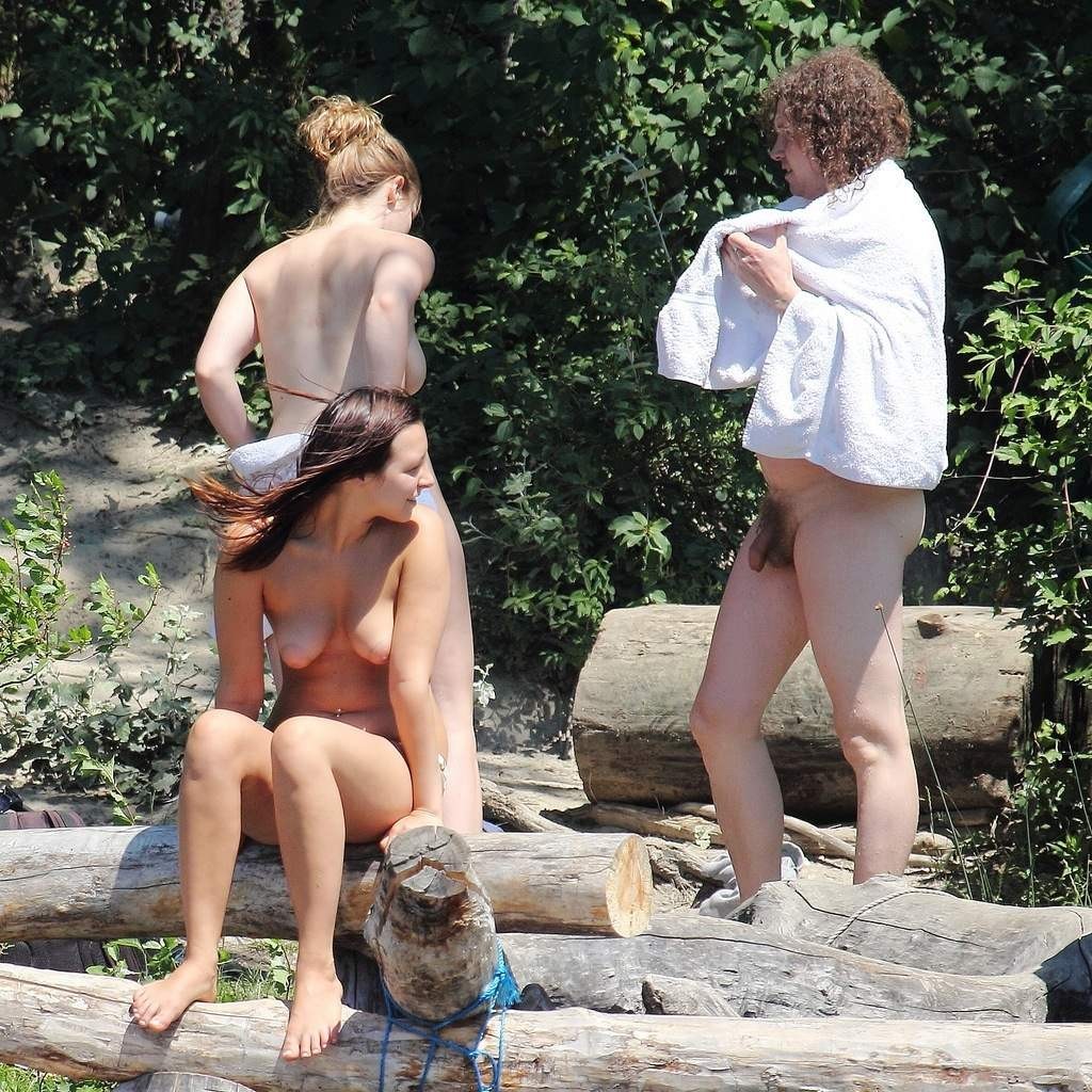 Perky breasted nude goddess poses on a general public beach #72246294