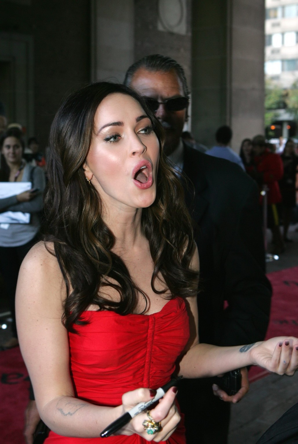 Megan Fox looks very sexy wearing red dress at the premiere in Toronto #75288859