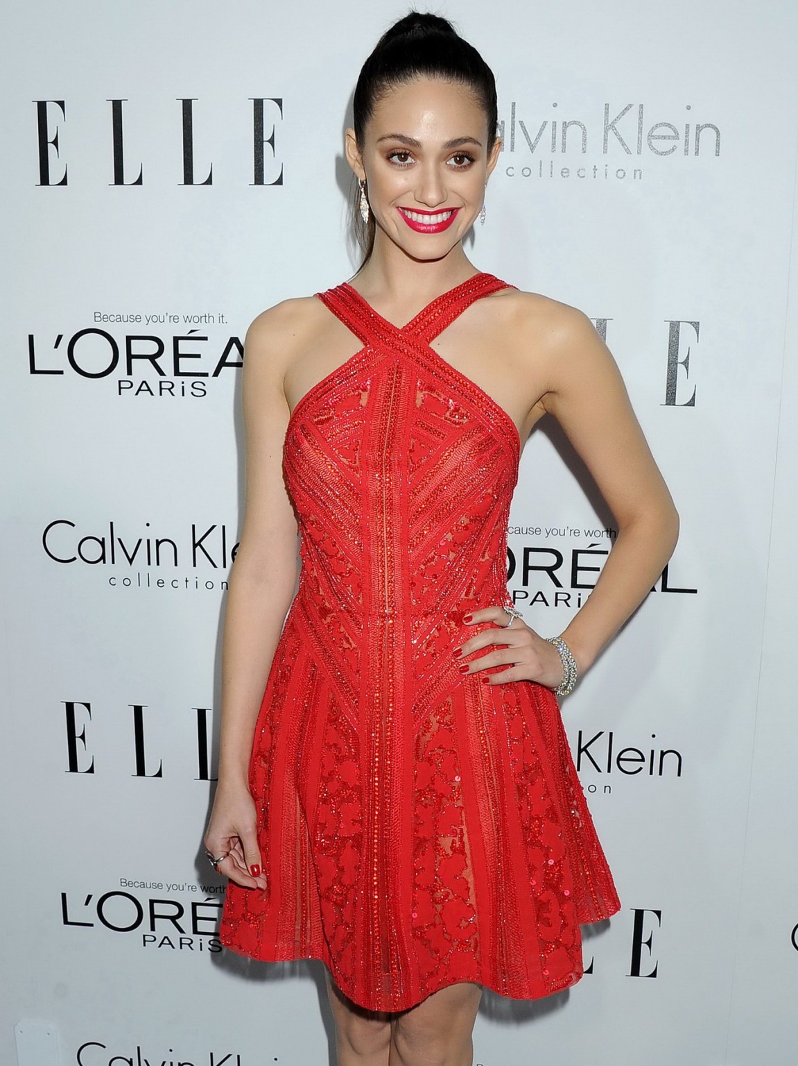 Emmy Rossum braless wearing red slightly see-through mini dress at ELLE's 20th A #75214943