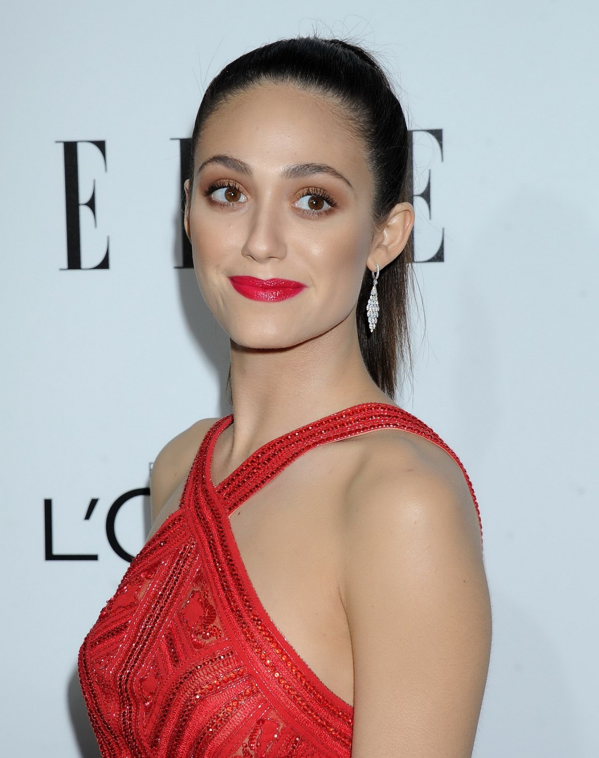 Emmy Rossum braless wearing red slightly see-through mini dress at ELLE's 20th A #75214953