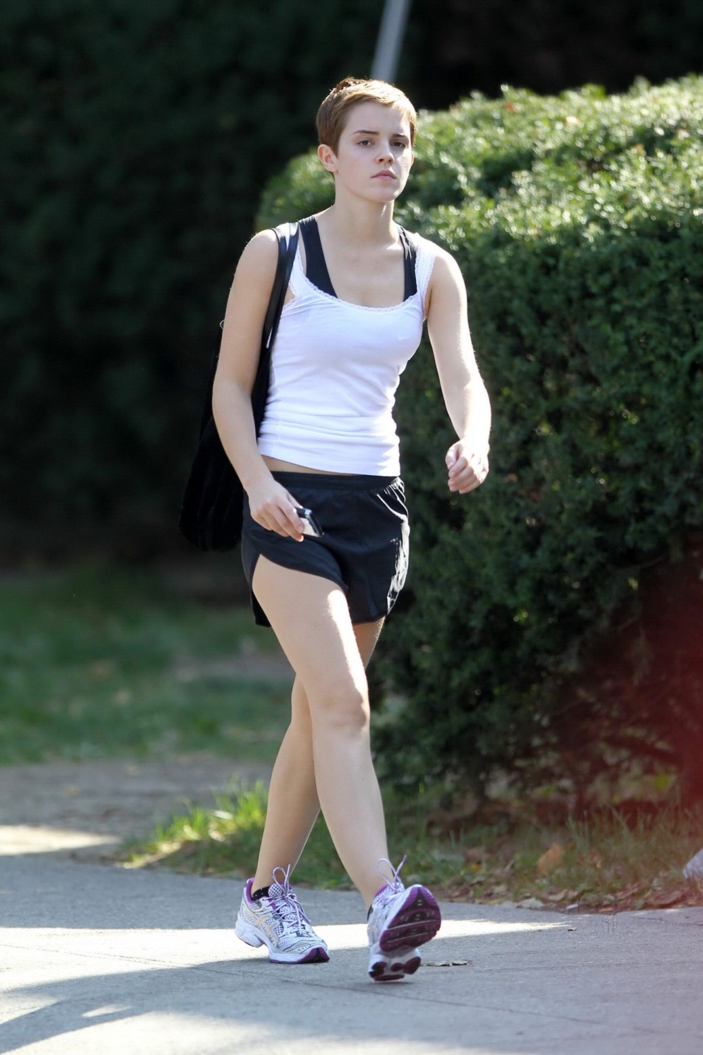 Emma Watson leggy in shorts after a gym class at Brown University #75331747