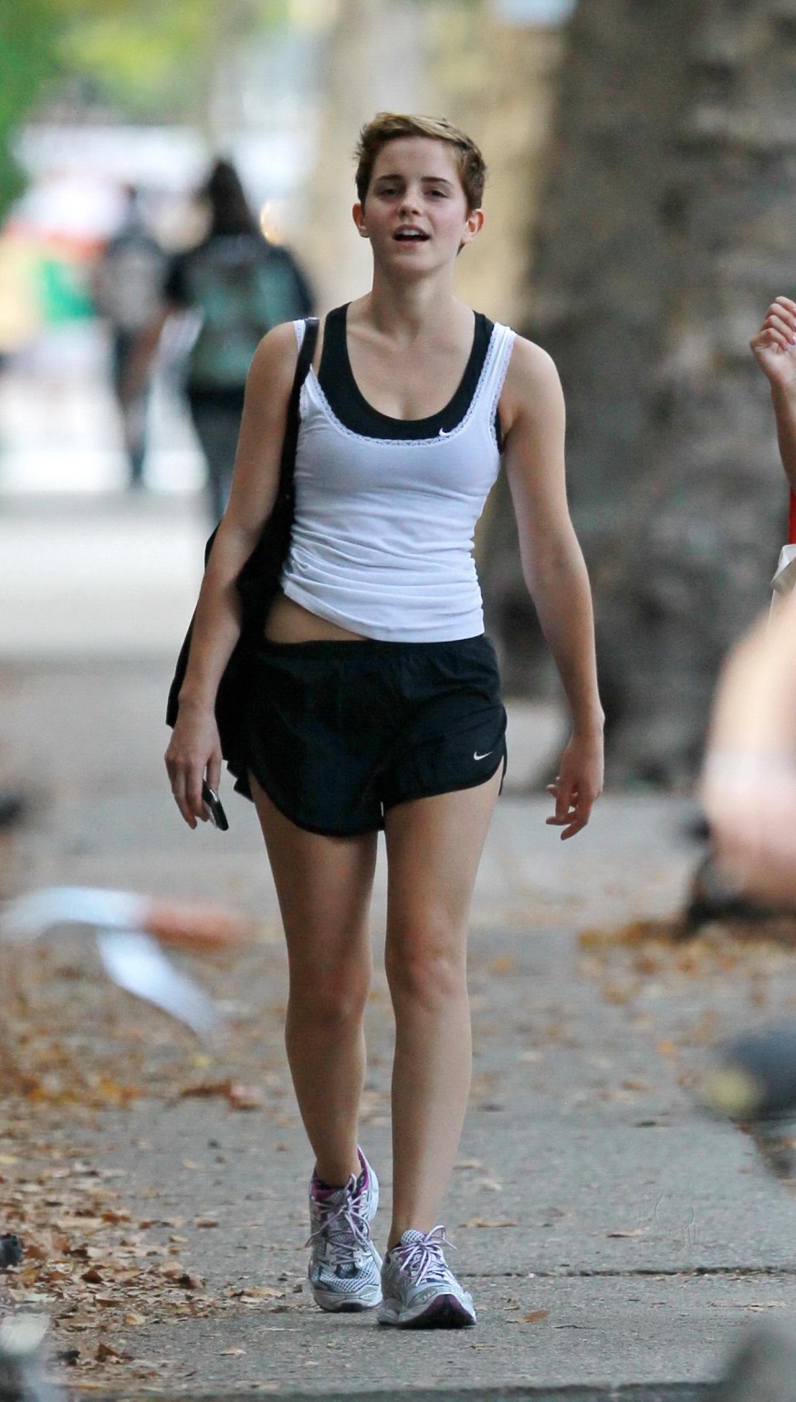 Emma Watson leggy in shorts after a gym class at Brown University #75331760