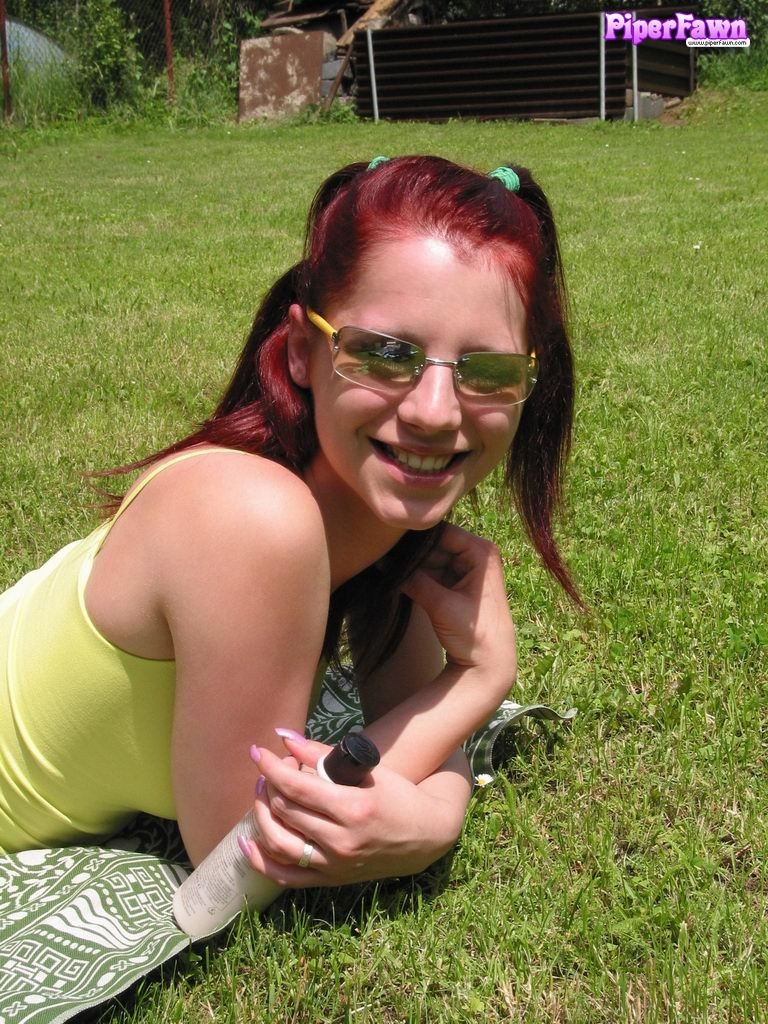 Busty redhead teen wearing sunglasses outdoors #78611963