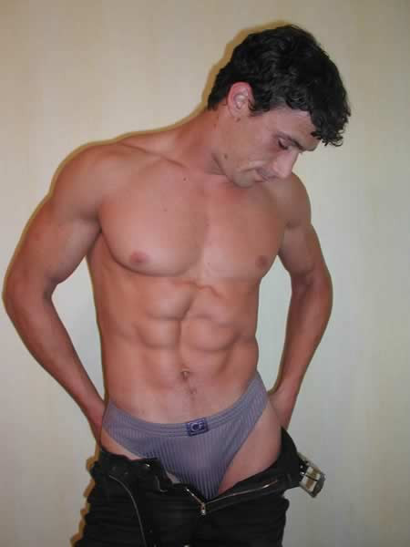 Muscular hunk showing off his body #77008889