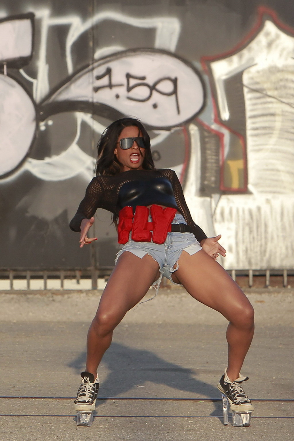 Ciara leggy in denim shorts showing her flexibility on the set of 'gimme dat' mu
 #75333689