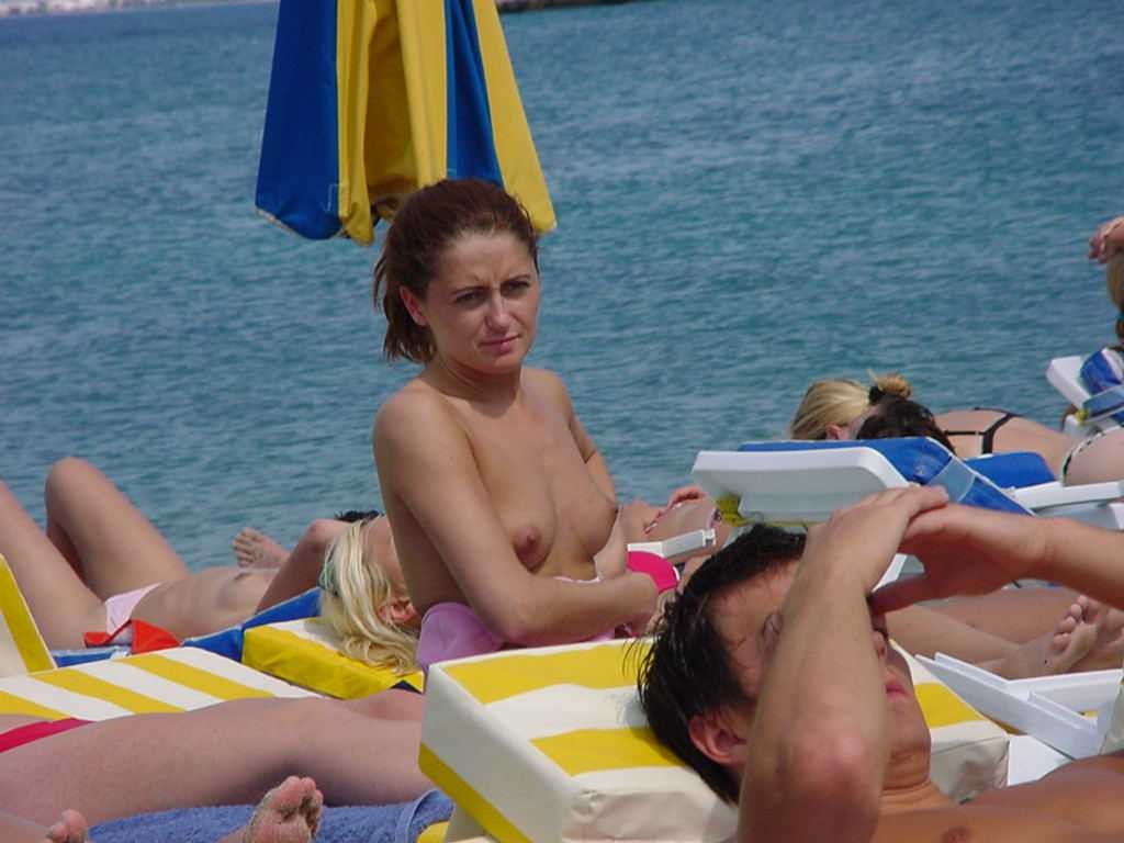 Barely legal young nudist lays naked at the beach #72252791