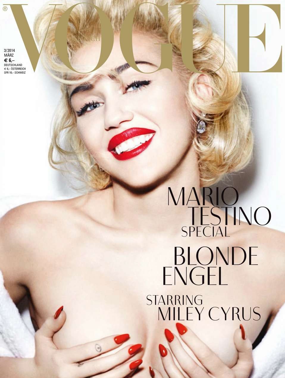 Miley Cyrus exposes her nude topless breasts for mag  #70890468