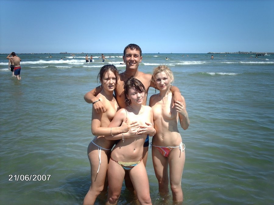 Friendly young Russian nudists lay on the beach #72248001