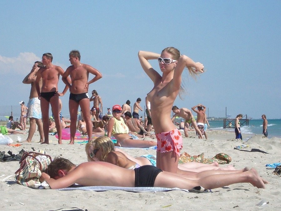 Friendly young Russian nudists lay on the beach #72248066