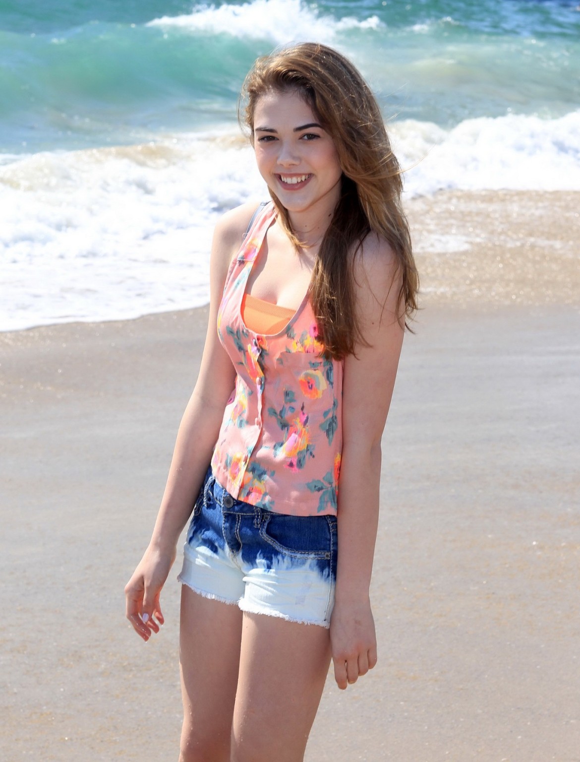 McKaley Miller wearing skimpy top and denim shorts at the beach in Los Angeles #75194396