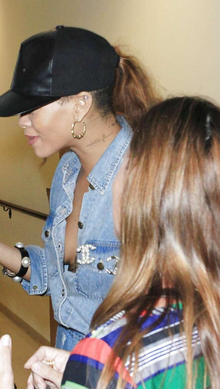 Rihanna looking sexy and exposing huge cleavage on street #75227511