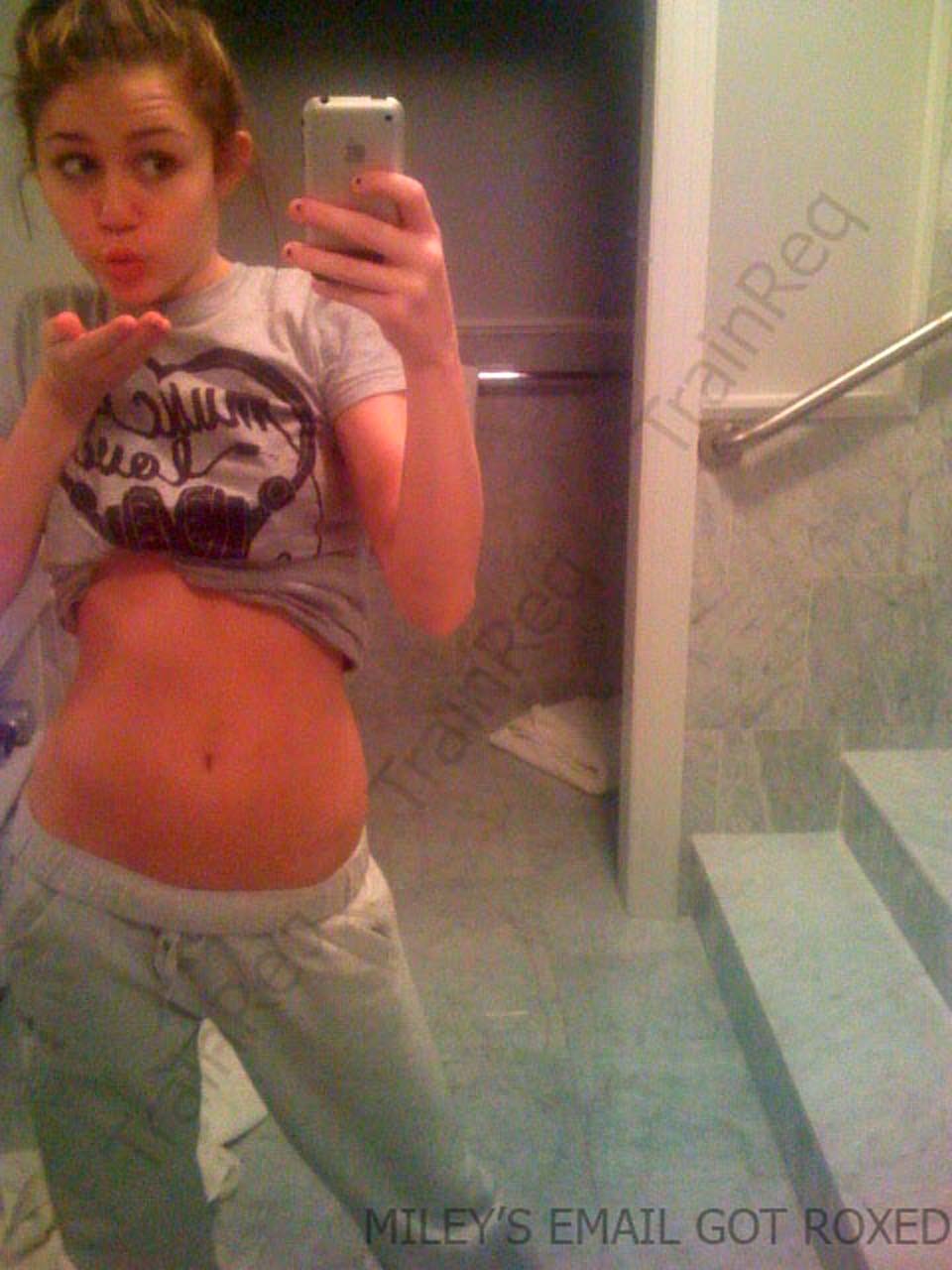 Miley Cyrus exposing her sexy body and nice tits in black bra #75299489