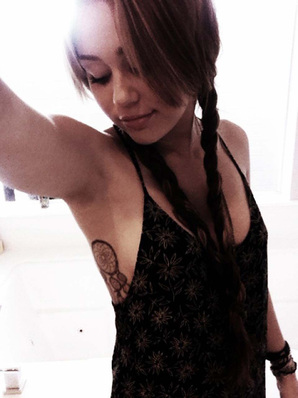 Miley Cyrus exposing her sexy body and nice tits in black bra #75299529