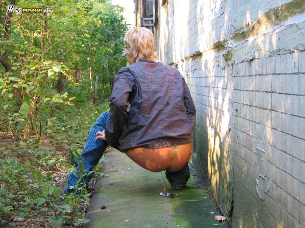 Blonde girl pissing outdoors #76587271