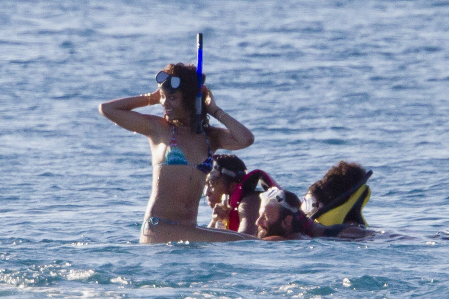 Rihanna in bikini showing ass  snorkeling near a Hawaiian beach #75275524