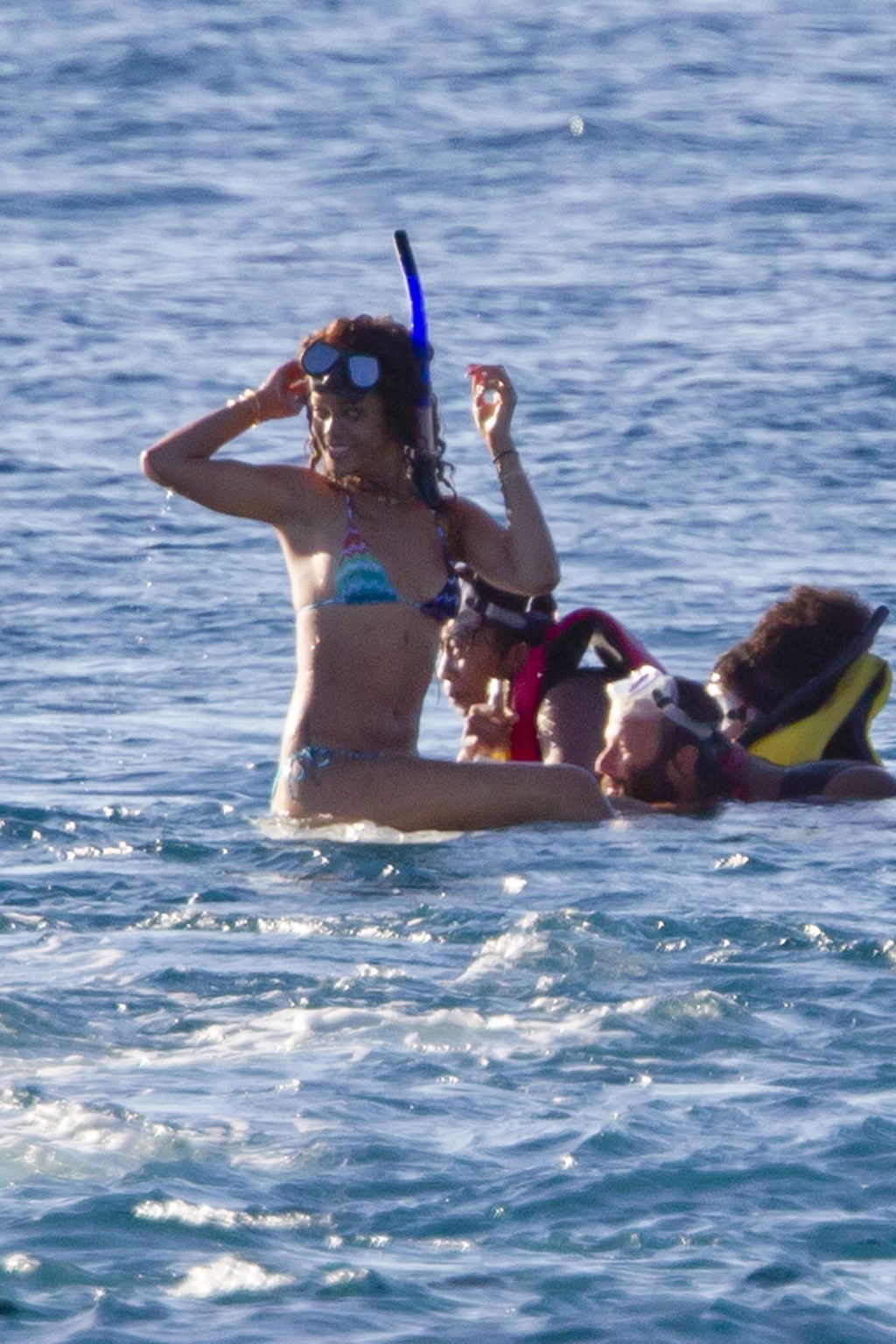 Rihanna in bikini showing ass  snorkeling near a Hawaiian beach #75275533