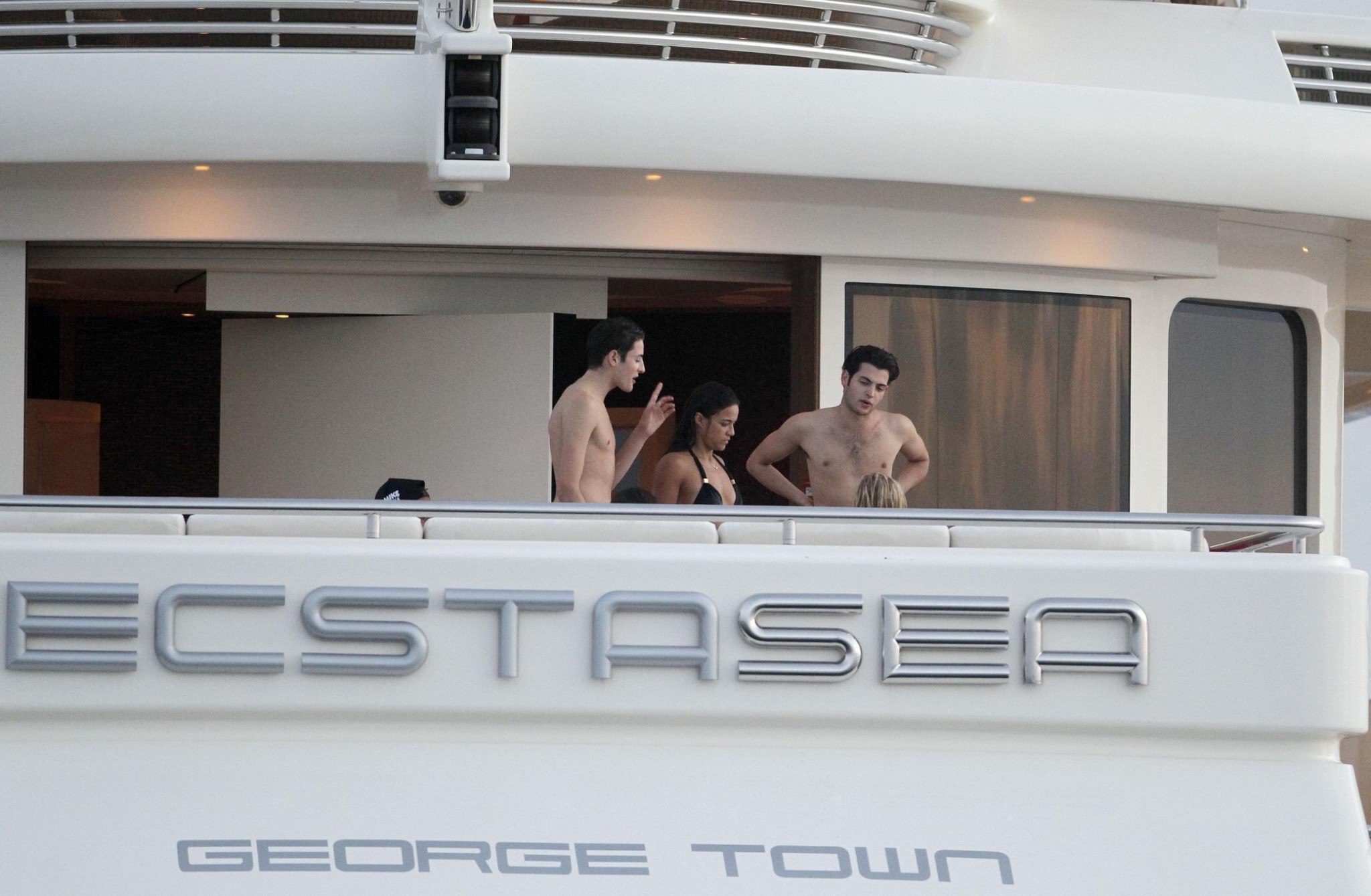 Michelle Rodriguez wearing a sexy black bikini on a yacht in Formentera #75188638