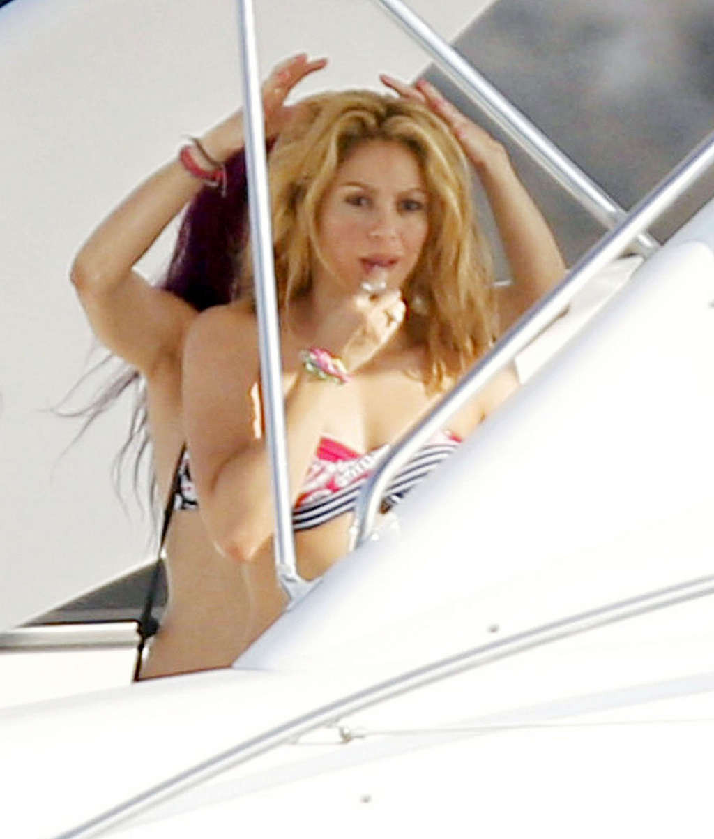 Shakira in bikini on yacht and upskirt on stage and in fuckme boots #75339905