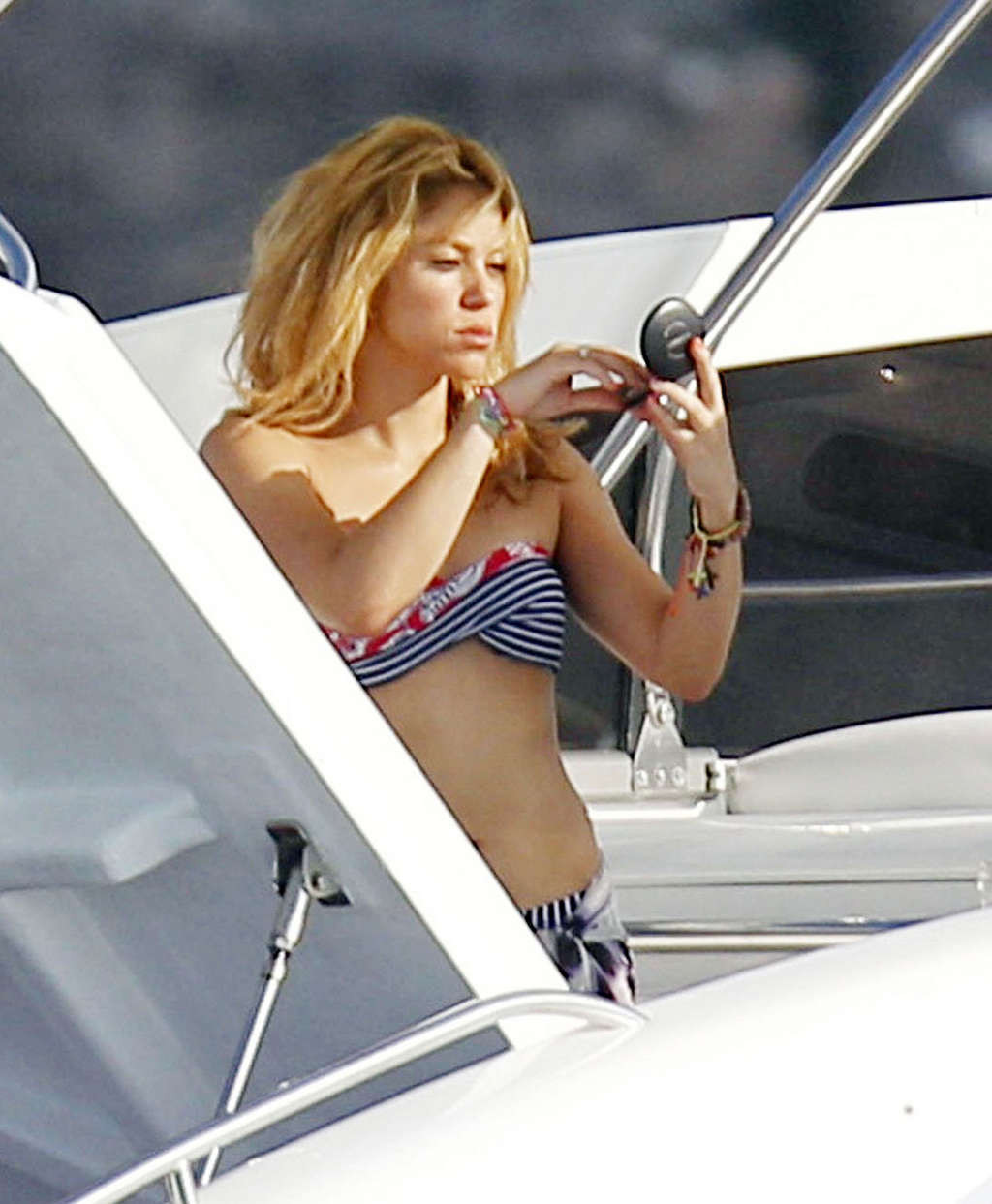 Shakira in bikini on yacht and upskirt on stage and in fuckme boots #75339909