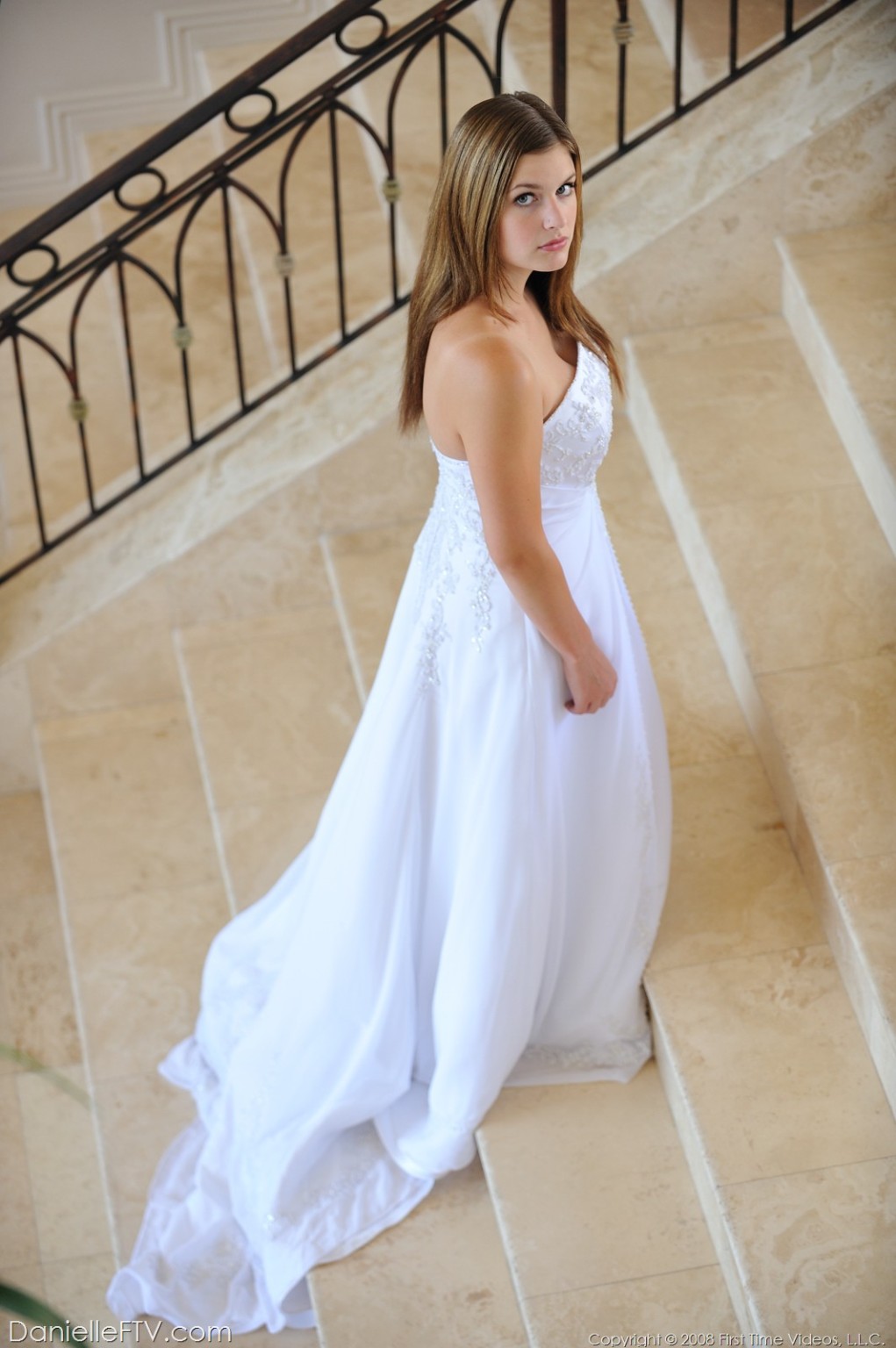 Danielle poses in a long white gown #71325131