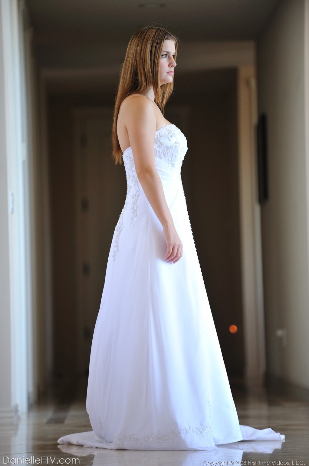 Danielle poses in a long white gown #71325203