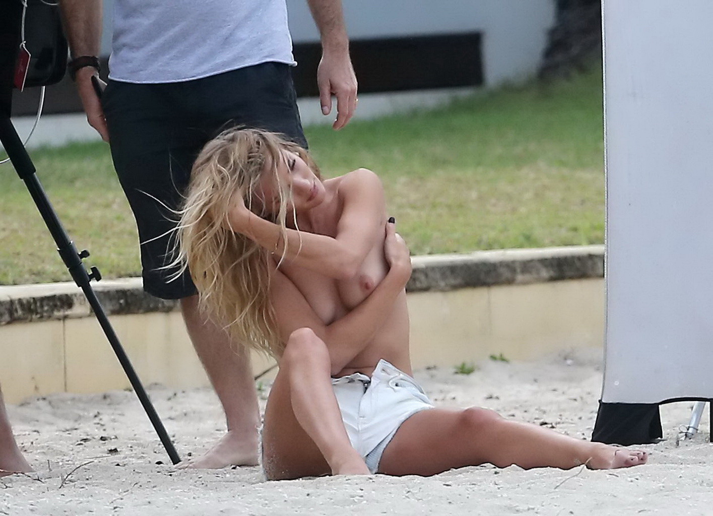 Rosie Huntington-Whiteley topless in a white denim shorts doing a beach photosho #75224265