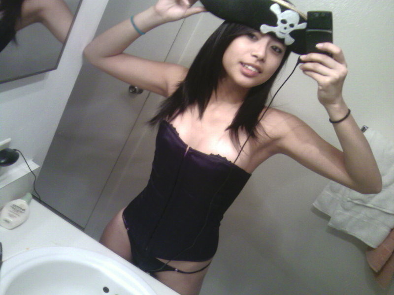 Really cute Asian teen having fun and taking mirror pics #69826570