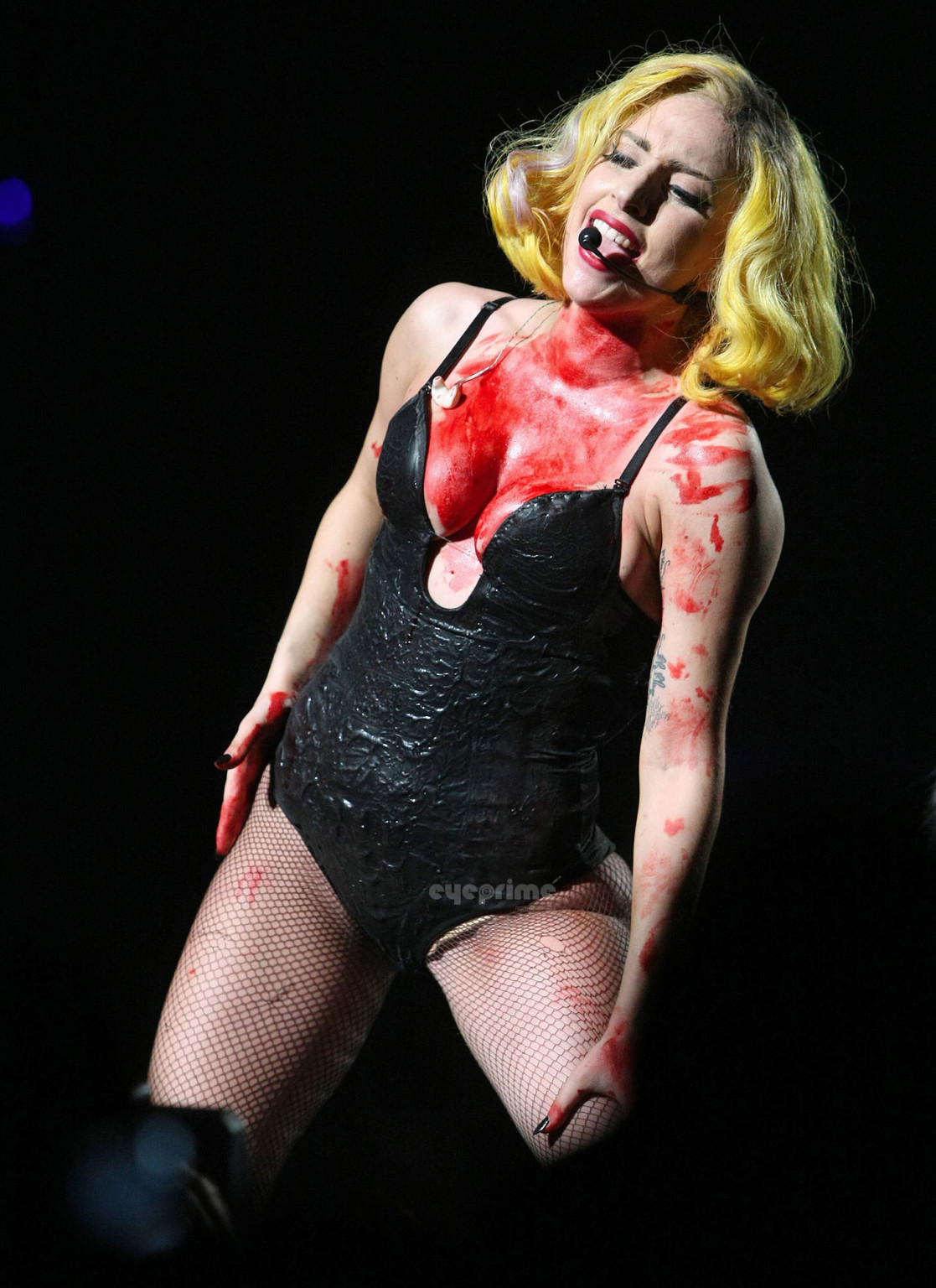 Lady Gaga as Vampirella in lingerie showing bloody cleavage on stage #75342614