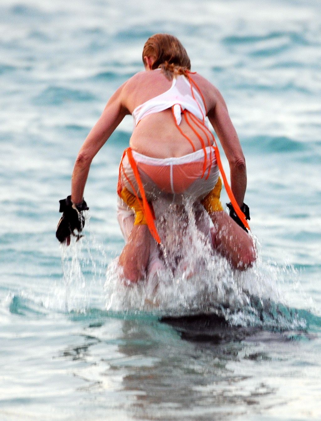 Nicollette Sheridan showing her wet bikini body while training on the beach in S #75265629