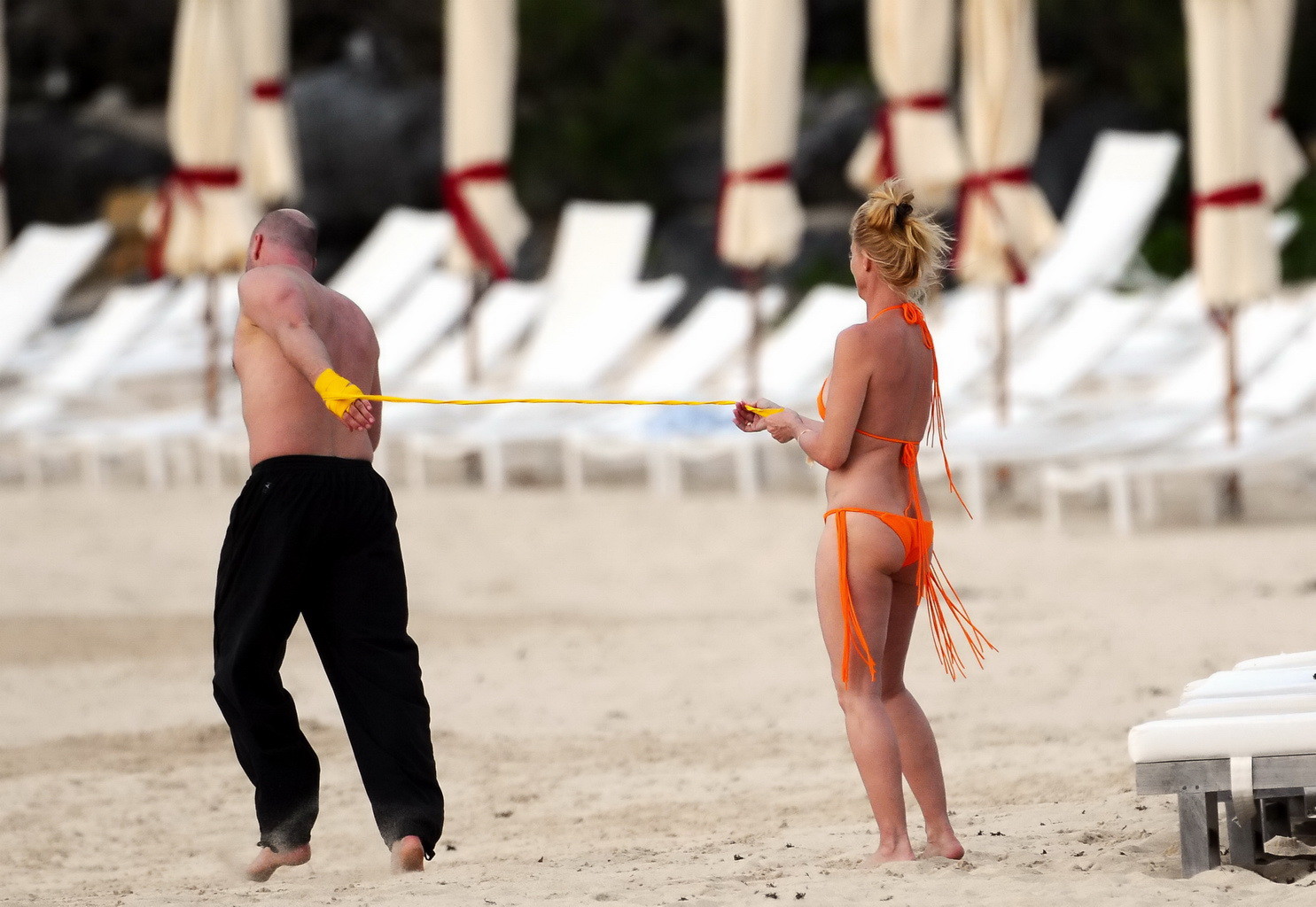 Nicollette Sheridan showing her wet bikini body while training on the beach in S #75265679