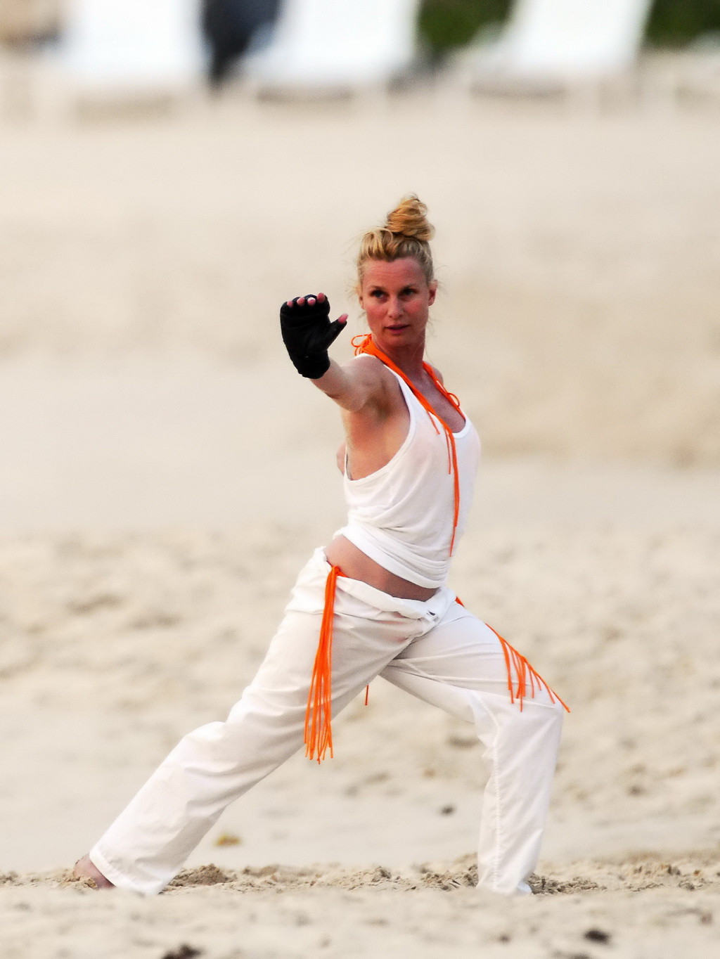 Nicollette Sheridan showing her wet bikini body while training on the beach in S #75265683