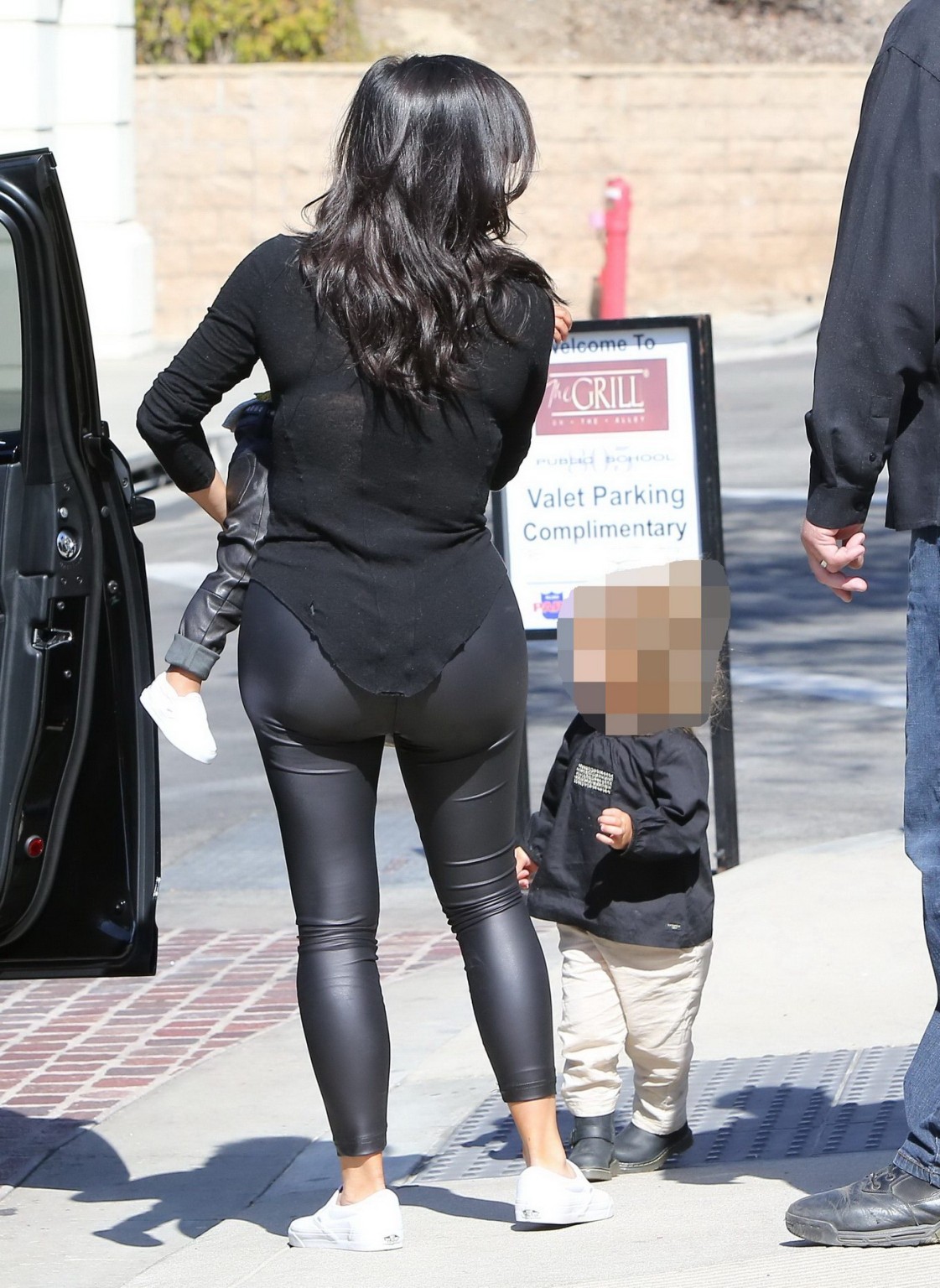 Kim Kardashian shows off her booty in black leather pants leaving The Grill in C #75183386