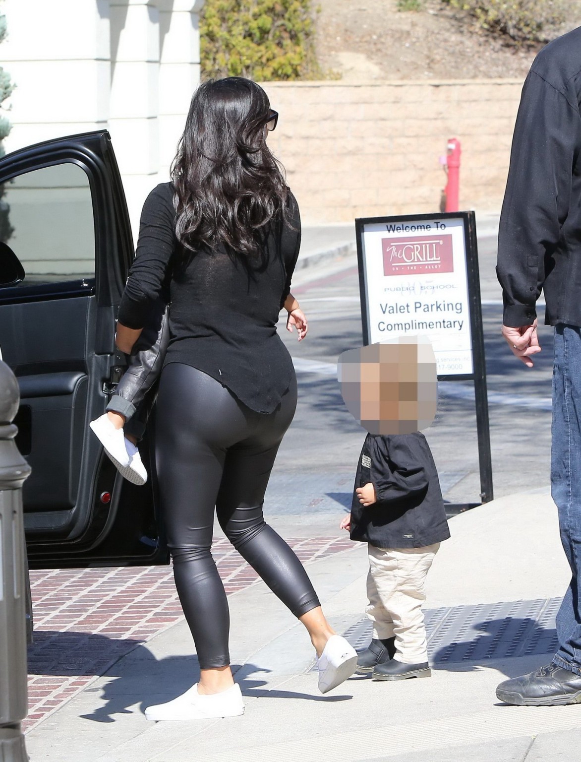 Kim Kardashian shows off her booty in black leather pants leaving The Grill in C #75183393