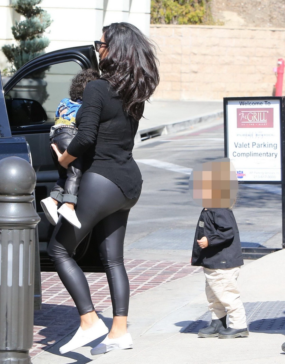 Kim Kardashian shows off her booty in black leather pants leaving The Grill in C #75183402