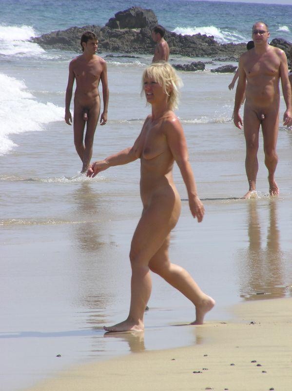 Sexy curvaceous cutie strips at a nudist beach #72252934
