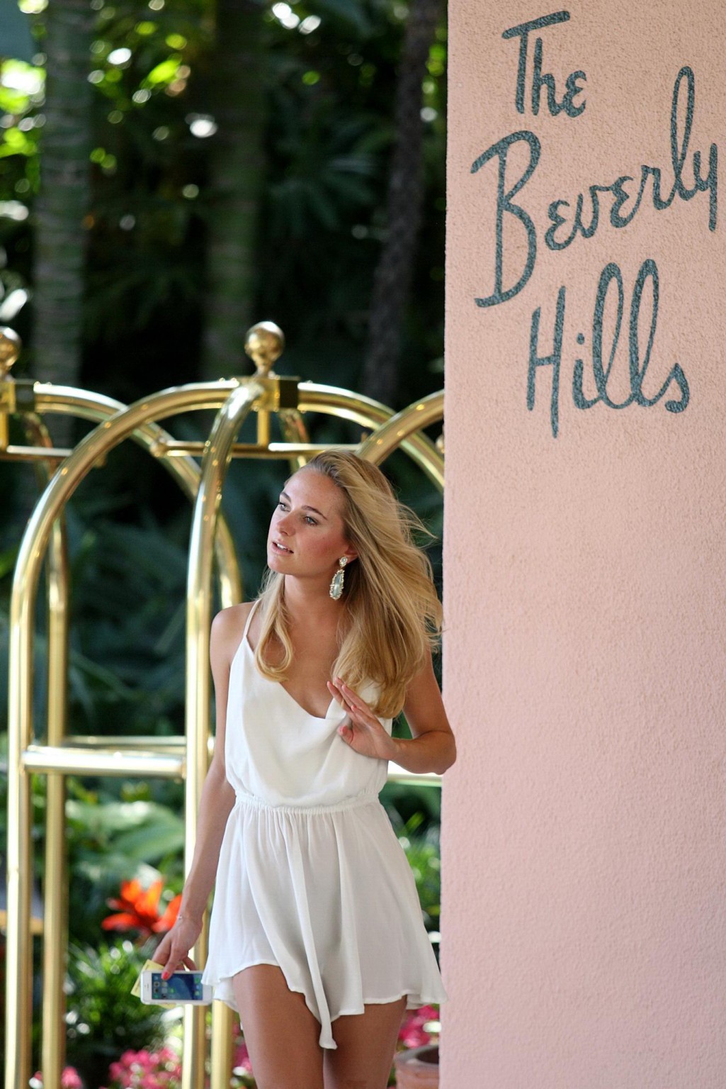 Kimberley Garner leggy wearing white mini dress outside the Beverly Hills Hotel #75196294