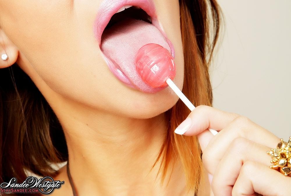 Sandee Westgate sticks a lollipop in her pussy and then licks it #71504074