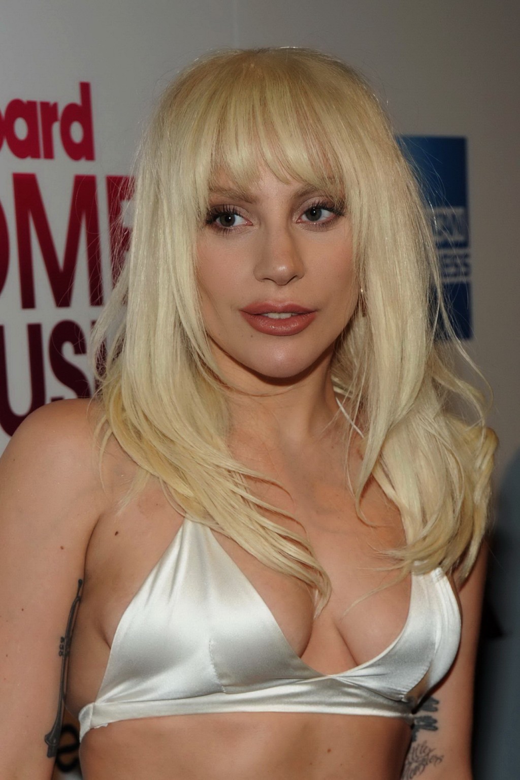 Lady Gaga busty in tiny white bra and skirt in public