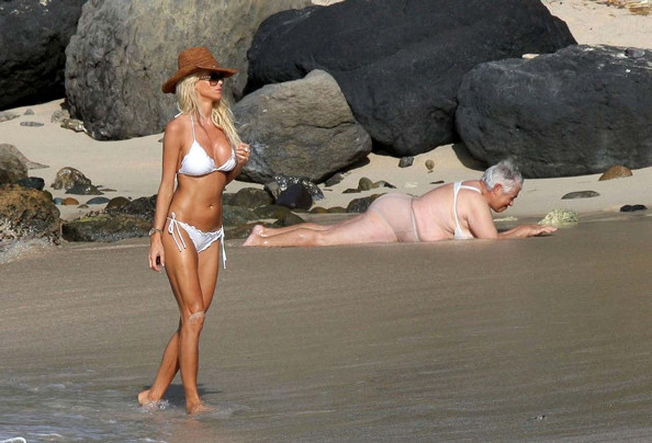 Victoria Silvstedt exposing her nice body in white bikini on beach #75321493