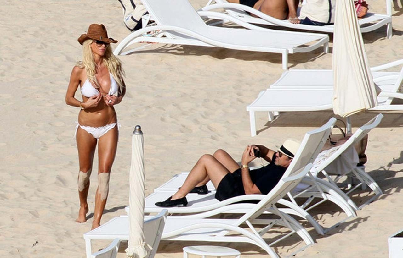 Victoria Silvstedt exposing her nice body in white bikini on beach #75321518