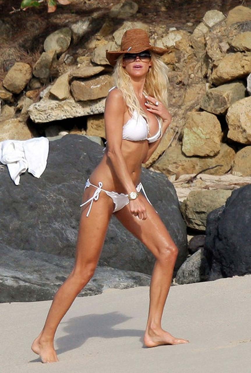 Victoria Silvstedt exposing her nice body in white bikini on beach #75321536