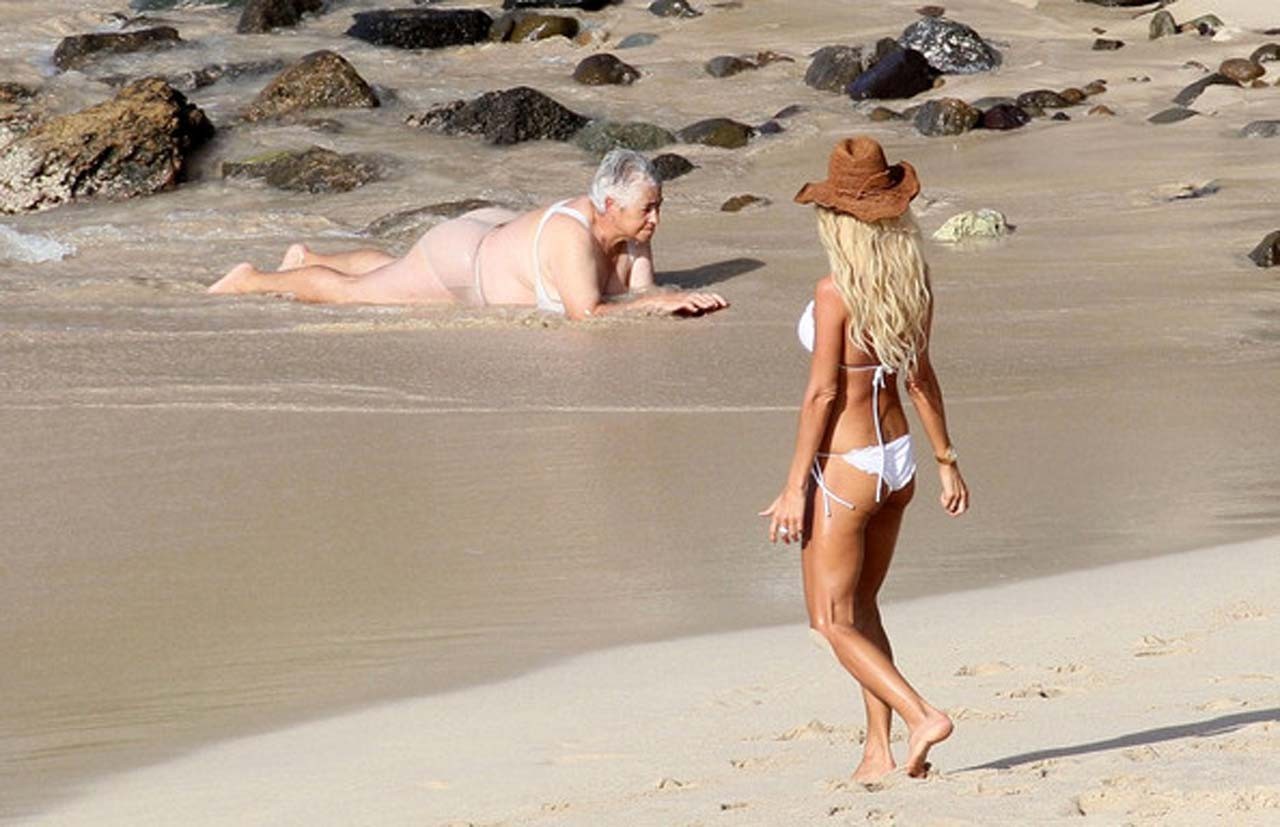 Victoria Silvstedt exposing her nice body in white bikini on beach #75321548