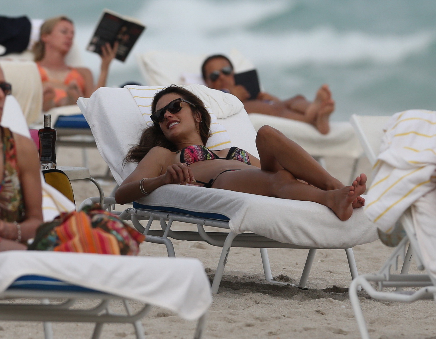 Alessandra Ambrosio tanning her hot body in a tiny colorful bikini at the beach  #75205711