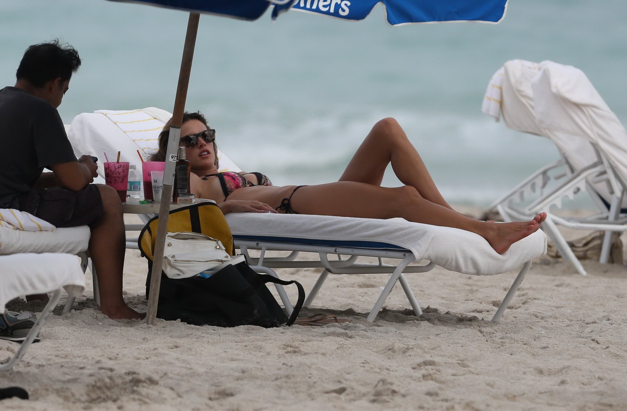 Alessandra Ambrosio tanning her hot body in a tiny colorful bikini at the beach  #75205755